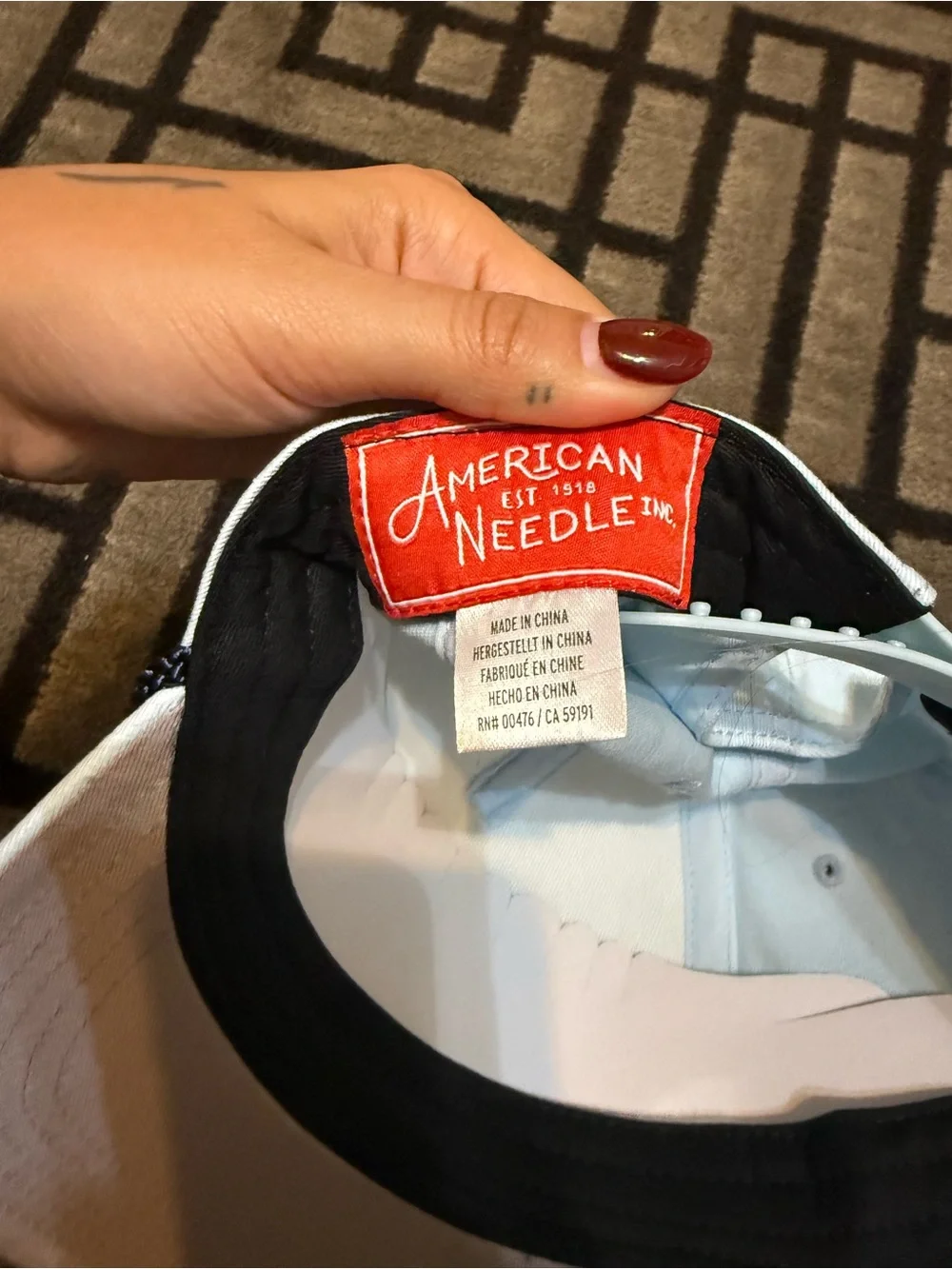 American Needle Light Blue and Black Baseball Cap with Red Label